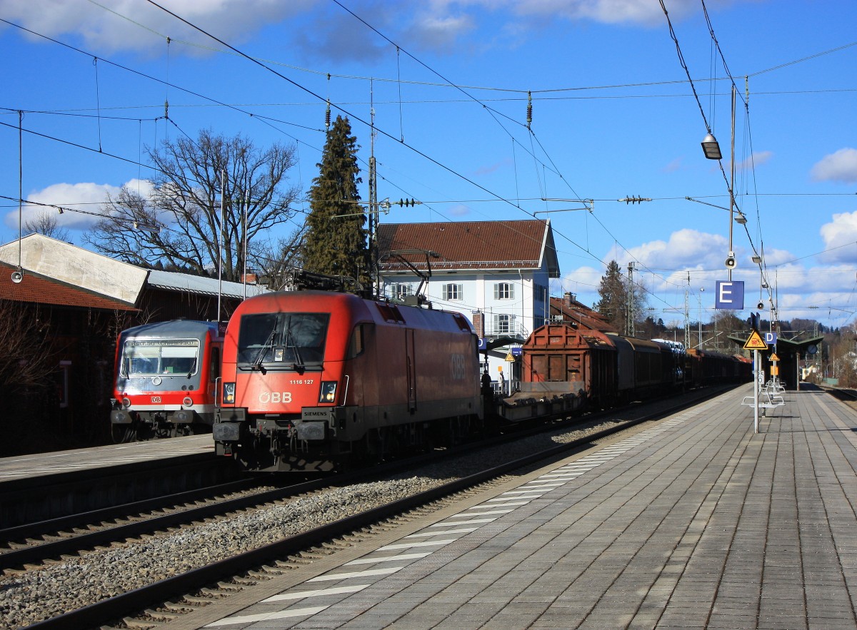 1116 127-2 war am 14. Februar 2014 mit einem gemischten G�terzug nach Salzburg unterwegs. Aufgenommen im Bahnhof von Prien am Chiemsee.