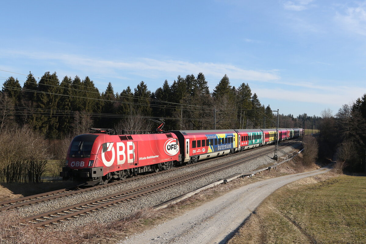 1116 249 mit dem  �FB-Railjet  am 3. M�rz 2022 bei Grabenst�tt im Chiemgau.