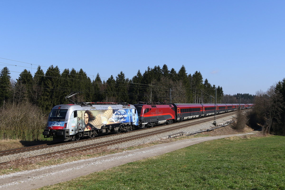 1216 019  Leonardo da Vinci  vorgespannt an einem Railjet aus Salzburg. Aufgenommen am 18. M�rz 2020 bei Grabenst�tt im Chiemgau.